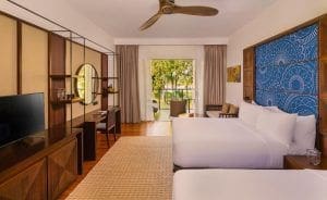 hoteles en Sri Lanka habitacion del Jetwing Gallery Kandy diseñada con estilo camas alfombra y muebles