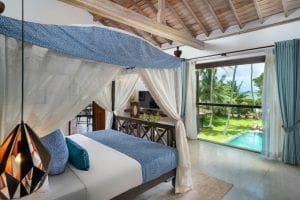 hoteles en sri lanka habitacion de Mosvold Balapitiya cama y vistas del jardin